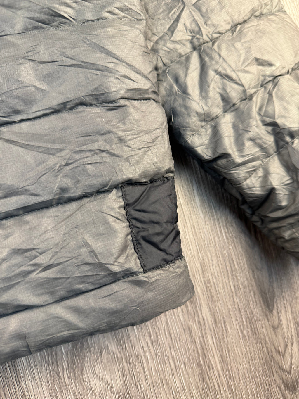 Men’s Patagonia down jacket (repaired) - medium