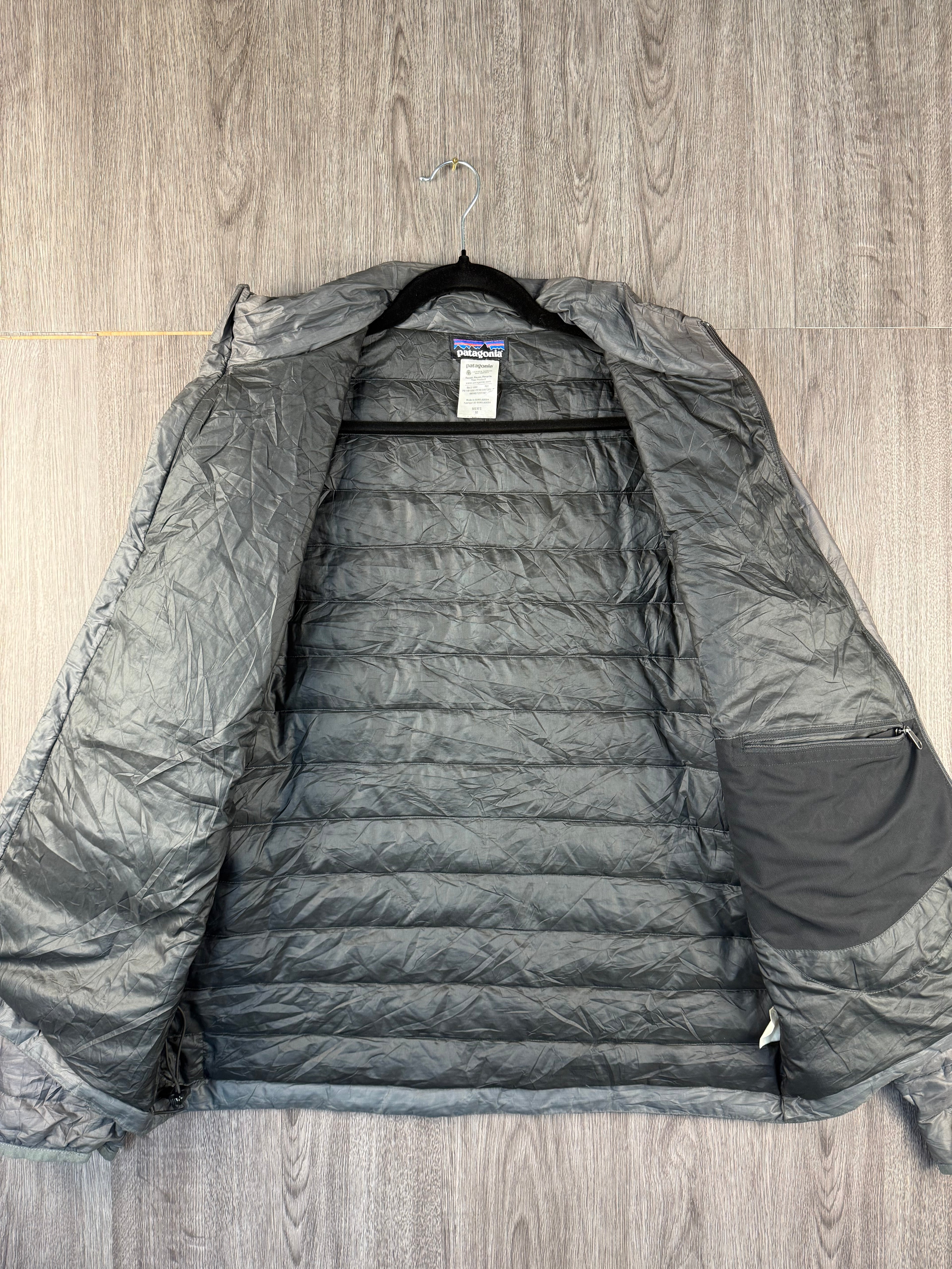 Men’s Patagonia down jacket (repaired) - medium